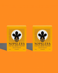 Two Nopalera Cactus Body Polish bars in Tangerine packaging against a bright orange background.