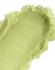 Close-up of  nopalera bosque místico body polish on a white background