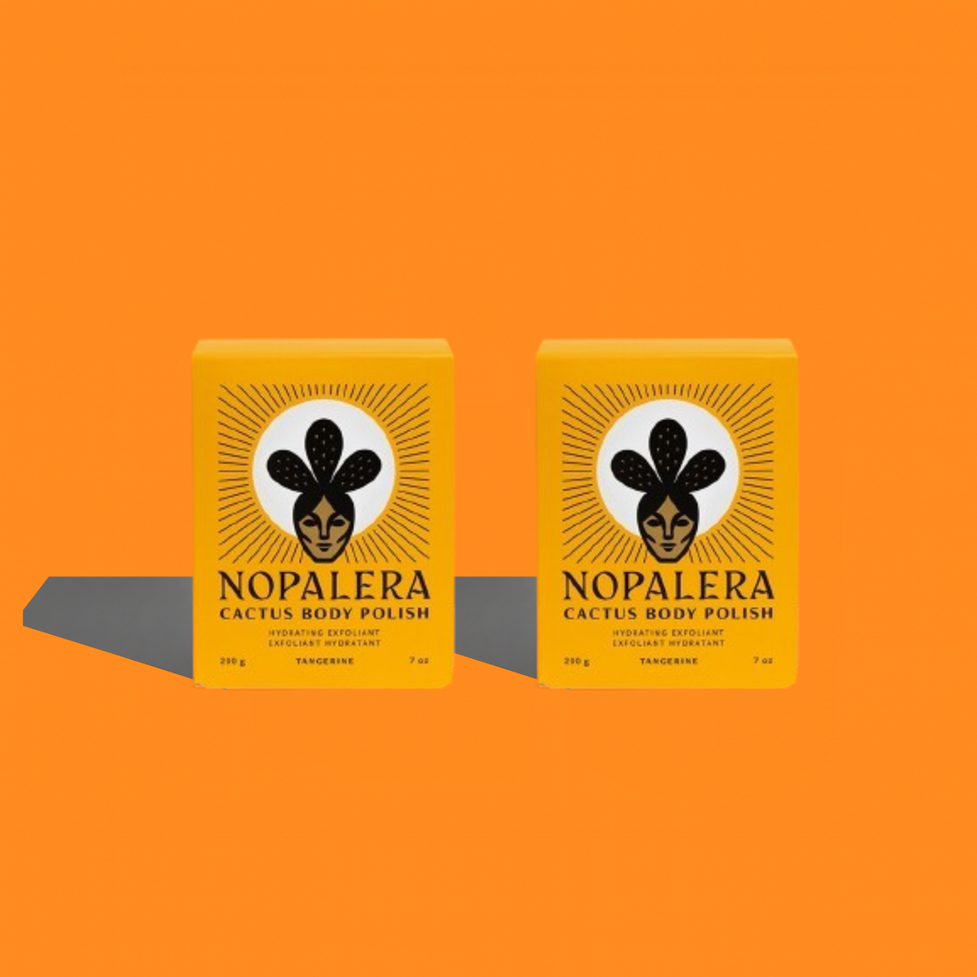 Two Nopalera Cactus Body Polish bars in Tangerine packaging against a bright orange background.