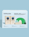 Nopalera shampoo and conditioner bar set with storage pouch and soap dish on a light blue background