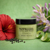 Jar of Nopalera Cactus Body Polish Bosque Místico with a red flower and green background
