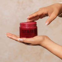 Red jar labeled 'Nopalera' with Hibiscus body polish